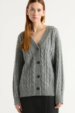 Zhenghong Textiles Hikari Asymmetric Cable Knit Cardigan< Sweaters