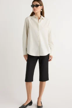 Hua Jia Phoebe Side-Button Tulip-Hem Shirt< Tops